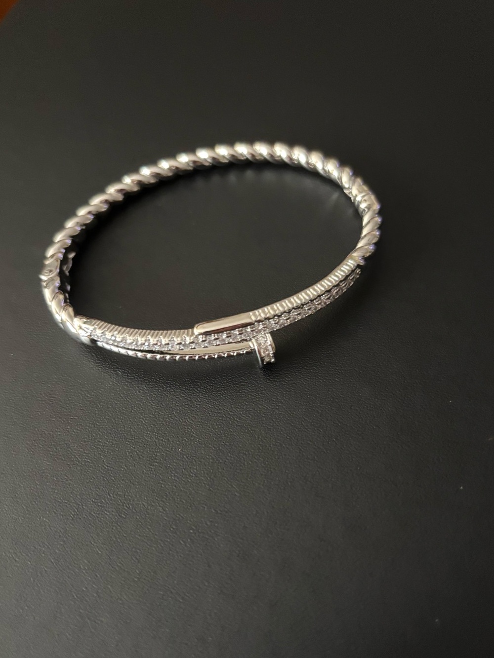White Gold Plated Pavé Nail Twisted Bangle